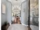 Inviting foyer with tiled floors, decorative lighting, and a clear view into the living spaces at 10406 Eastwood Dr, Bradenton, FL 34211