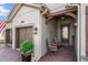 Charming front porch with brick pavers, a small seating area, and a well-maintained exterior at 10406 Eastwood Dr, Bradenton, FL 34211