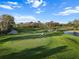 A scenic view of the lush golf course at Rosedale Country Club at 10406 Eastwood Dr, Bradenton, FL 34211
