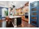 A modern kitchen featuring a large island, stainless steel appliances, and ample cabinet space at 10406 Eastwood Dr, Bradenton, FL 34211