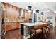 Large open kitchen with kitchen island, granite countertops, and stainless steel appliances at 10406 Eastwood Dr, Bradenton, FL 34211
