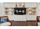 Inviting living room with custom built-in shelves and decorative elements at 10406 Eastwood Dr, Bradenton, FL 34211