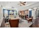 Open-concept living space featuring a gourmet kitchen and a cozy sitting area at 10406 Eastwood Dr, Bradenton, FL 34211