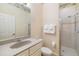 Well-maintained bathroom with a shower, vanity sink, and neutral decor, ready for relaxation at 12211 Lavender Loop, Bradenton, FL 34212