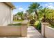 Welcoming entryway with a brick walkway and manicured landscaping, offering a glimpse of the inviting home at 12211 Lavender Loop, Bradenton, FL 34212
