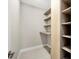 Bright closet with built-in shelves provides optimal storage space at 12495 Patsy Ave, Port Charlotte, FL 33981