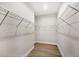 Walk-in closet with ample shelving for storage and organization at 12495 Patsy Ave, Port Charlotte, FL 33981