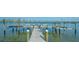 Picture of private dock, chairs, and a boat lift at 1300 Tangier Way, Sarasota, FL 34239