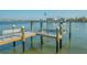 Close up of the private dock and boat lift at 1300 Tangier Way, Sarasota, FL 34239