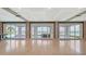 Spacious living room with wall of sliding glass doors that provide a great view of the water at 1300 Tangier Way, Sarasota, FL 34239