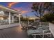Spacious deck featuring waterfront views, a lounge chair, and outdoor seating area at 1528 43Rd Avenue W Dr, Palmetto, FL 34221