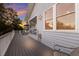 Inviting deck area with outdoor seating, a screened-in porch, and water views at 1528 43Rd Avenue W Dr, Palmetto, FL 34221