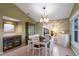 Dining room featuring decorative chandelier, recessed lighting, and bright windows at 1528 43Rd Avenue W Dr, Palmetto, FL 34221