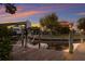 Private dock featuring boat lift, providing convenient access to waterway, with lush landscaping and home view at 1528 43Rd Avenue W Dr, Palmetto, FL 34221