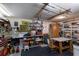 Spacious garage with fishing rod racks, tool storage, and a workbench at 1528 43Rd Avenue W Dr, Palmetto, FL 34221