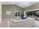 Bright living room with neutral color palette, fireplace, and access to outdoor deck at 1528 43Rd Avenue W Dr, Palmetto, FL 34221