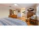Main bedroom with wood floors, ceiling fan, bright windows and ample natural light at 1528 43Rd Avenue W Dr, Palmetto, FL 34221