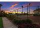 Community tennis courts surrounded by manicured gardens offers a picturesque recreational space at 1528 43Rd Avenue W Dr, Palmetto, FL 34221