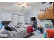 Bedroom with personal belongings and ceiling fan at 16211 Rambling Vine W Dr, Tampa, FL 33624