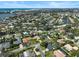 Stunning aerial view of the neighborhood with waterfront access and lush landscaping, near the Gulf of Mexico at 1939 Baywood Pl, Sarasota, FL 34231