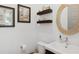 Chic powder room featuring stylish decor, modern fixtures, and a convenient layout at 2220 Pine Ter, Sarasota, FL 34231