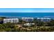 Scenic waterfront condo complex with well-manicured landscaping and views of the bay at 2410 Harbourside Dr # 121, Longboat Key, FL 34228