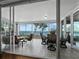 Spacious lanai with tile flooring and comfortable seating to enjoy the views at 2410 Harbourside Dr # 121, Longboat Key, FL 34228