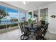 Inviting lanai perfect for outdoor dining and relaxing with stunning waterfront views at 2410 Harbourside Dr # 121, Longboat Key, FL 34228