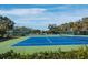 Beautifully maintained tennis courts in a lush and tropical setting at 2410 Harbourside Dr # 121, Longboat Key, FL 34228