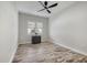 Guest bedroom with hard surface flooring and neutral color palette at 26833 Weiskopf Dr, Englewood, FL 34223