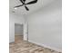 Bedroom with light walls and flooring, ready for personal touches and decor at 26833 Weiskopf Dr, Englewood, FL 34223