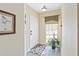 Bright foyer with tile flooring and stylish decor accents at 306 Lynbrook Cir # 201, Venice, FL 34292