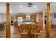 Open-concept kitchen boasts an island cooktop and stylish wooden cabinetry at 34200 State Road 62, Parrish, FL 34219