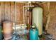 Features of the water equipment, pipes, and tanks for the property's water system at 34200 State Road 62, Parrish, FL 34219