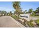 Landscaped sign for 'The Hammocks' greets you upon entry at 3751 Eagle Hammock Dr, Sarasota, FL 34240