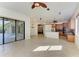 Open-concept layout connecting kitchen to outdoor living space via sliding doors at 3751 Eagle Hammock Dr, Sarasota, FL 34240