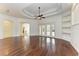 An expansive room with hardwood floors and recessed lighting is ideal for both relaxation and entertaining guests at 3751 Eagle Hammock Dr, Sarasota, FL 34240