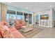 Spacious living room with an open floor plan and sliders to an outdoor area with beautiful water views at 383 Aruba Cir # 102, Bradenton, FL 34209