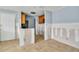 Unfinished kitchen with tile floors, awaiting transformation with appliances and wooden cabinets at 4008 Crockers Lake Blvd # 13, Sarasota, FL 34238