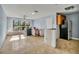 Spacious kitchen with tile floor, appliances and wooden cabinets, primed for renovation at 4008 Crockers Lake Blvd # 13, Sarasota, FL 34238