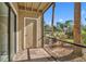 A screened-in patio with outdoor storage at 4008 Crockers Lake Blvd # 13, Sarasota, FL 34238