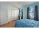 Bedroom with light wood floor and big windows at 4658 Sabal Key Dr, Bradenton, FL 34203