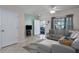 Inviting living room features tile flooring, neutral paint, and a comfortable sectional sofa at 4658 Sabal Key Dr, Bradenton, FL 34203
