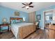 Inviting bedroom with rattan furniture, hardwood floors, and ample natural light at 503 Park Dr, Bradenton, FL 34209
