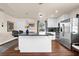 Well-equipped kitchen featuring stainless steel appliances, granite countertops, and breakfast bar with pendant lighting at 503 Park Dr, Bradenton, FL 34209