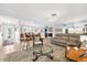 Bright and airy living room featuring tile floors, neutral walls, and modern furnishings at 503 Park Dr, Bradenton, FL 34209