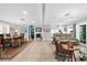 Spacious open-concept living room with tile floors, a dining area, and direct access to the kitchen at 503 Park Dr, Bradenton, FL 34209
