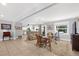 Cozy living room with neutral walls, tile flooring, and comfortable seating arrangement at 503 Park Dr, Bradenton, FL 34209