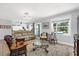 Inviting living room with comfortable seating, tile flooring, and neutral decor at 503 Park Dr, Bradenton, FL 34209
