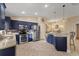 Stylish kitchen boasts stainless steel appliances, granite counters, and ample cabinet space for seamless cooking at 5141 Lansdowne Way, Palmetto, FL 34221